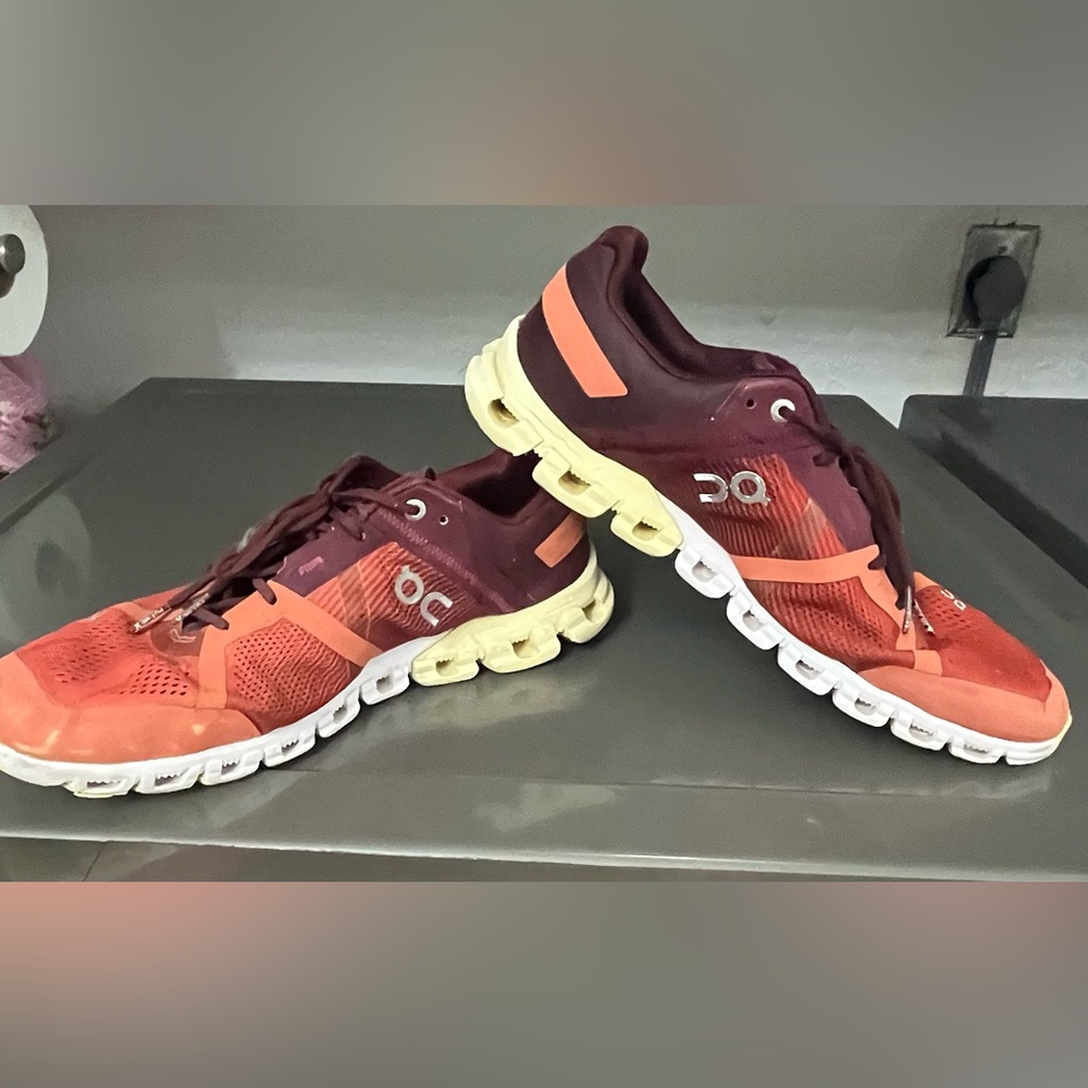 On Running Vibrant Orange and Deep Burgundy Shoes